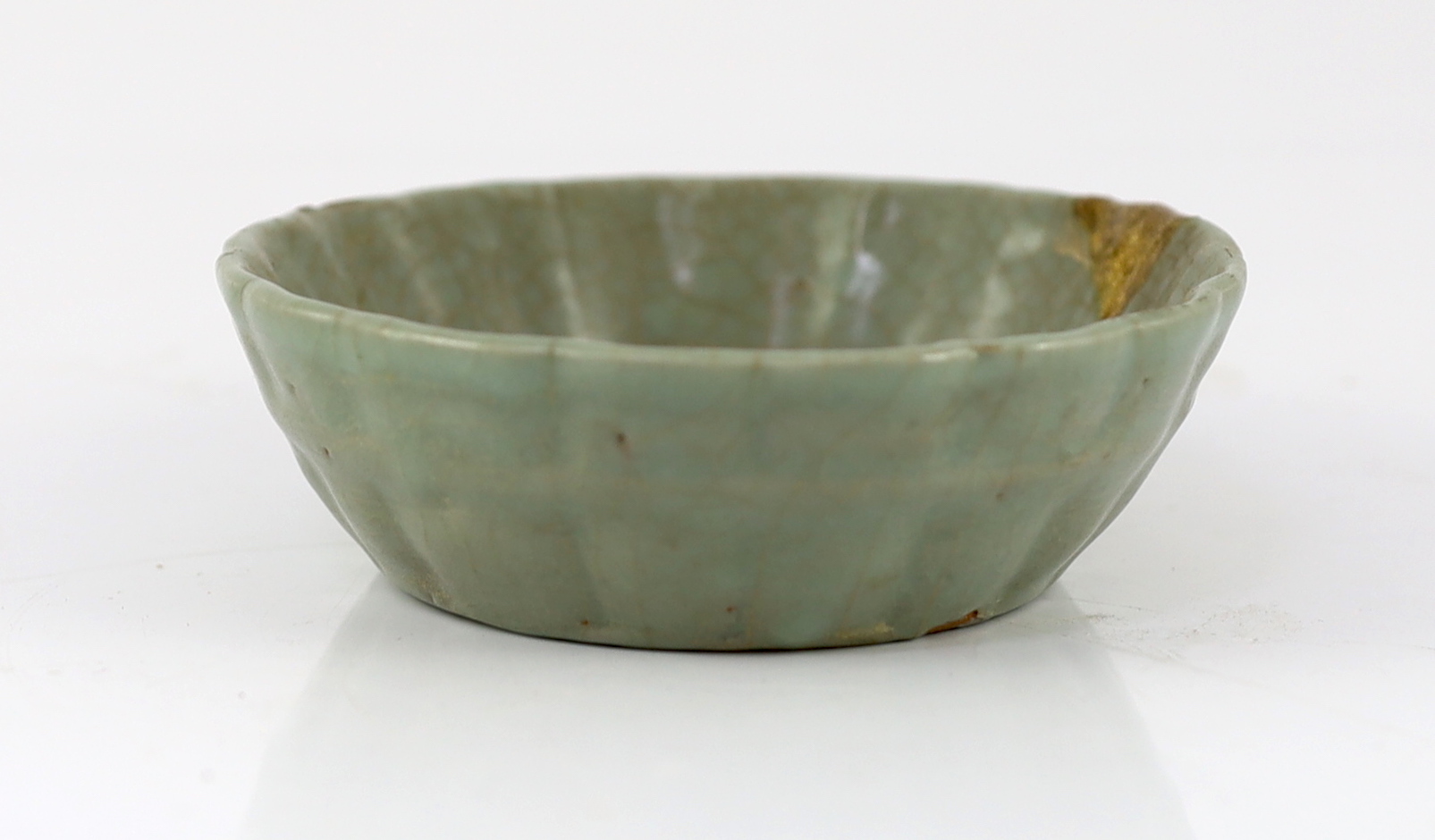 A Chinese Longquan celadon fluted brush washer, Yuan dynasty